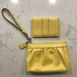 Coach pastel yellow wristlet and matching wallet